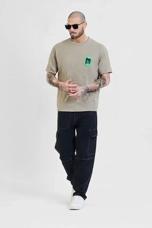 Men’s Beige Graphic T-Shirt with Neon Green “M” Logo – Urban Casual Streetwear
